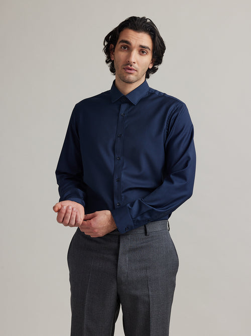 man wearing merino wol slim fit shirt in navy blue color with long sleeves from Wolk