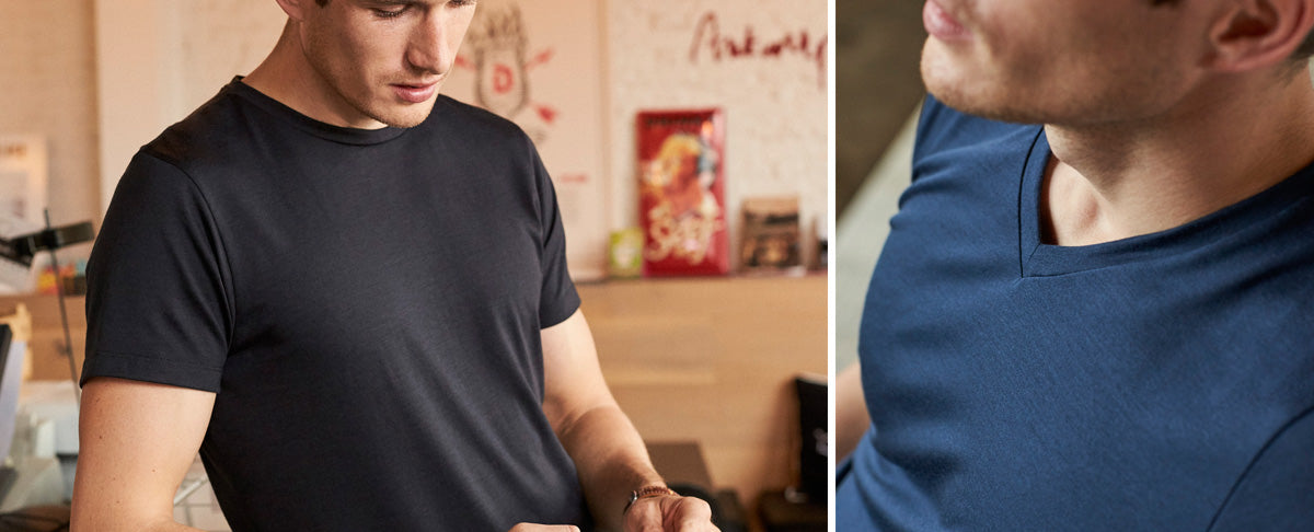 Man wearing merino wool T-shirts in blue V neck and black round neck